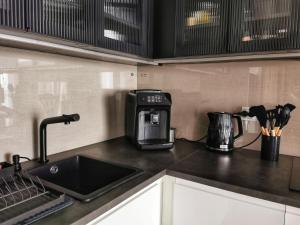 Kuchyňa alebo kuchynka v ubytovaní Smart Apartament Grunwaldzka 240