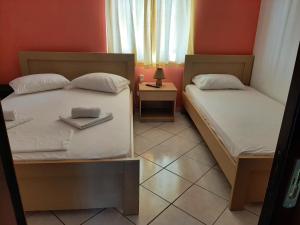 A bed or beds in a room at Studios Achileus 2