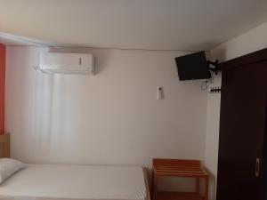 A television and/or entertainment centre at Studios Achileus 2