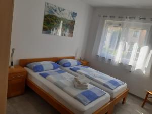 En eller flere senge i et værelse på Apartments Ivana with the pool + 57 billeder