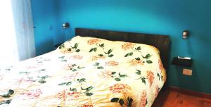 Postel nebo postele na pokoji v ubytování AMOROSO FAMILY + 1 fotografie