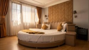 Postel nebo postele na pokoji v ubytování Farina Hotel By Cigno