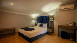 Postel nebo postele na pokoji v ubytování Farina Hotel By Cigno