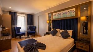 Postel nebo postele na pokoji v ubytování Farina Hotel By Cigno