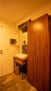 Kuchyň nebo kuchyňský kout v ubytování Farina Hotel By Cigno