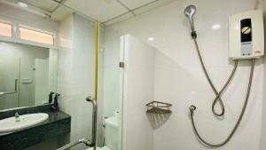 a bathroom with a shower and a sink at Phuket Town Condo 2 Bedroom with Balcony-Cats Friendly in Phuket Town +43 photos