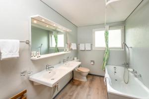 Ванна кімната в CPM Apartments