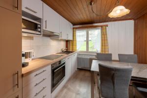 Кухня або міні-кухня у CPM Apartments