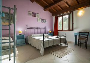 Postel nebo postele na pokoji v ubytování B&B Stell'e Mari