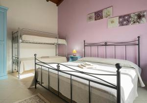 Postel nebo postele na pokoji v ubytování B&B Stell'e Mari