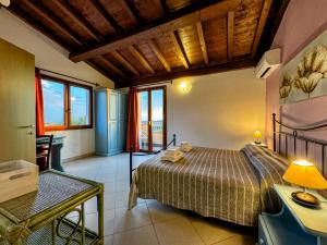 Postel nebo postele na pokoji v ubytování B&B Stell'e Mari