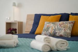 Postel nebo postele na pokoji v ubytování Il Vicolo - Vacanze in Sardegna