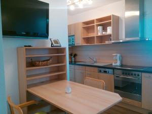A cozinha ou cozinha compacta de Ferienwohnung Sayntalblick