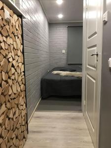 En eller flere senge i et værelse på Tunnelmallinen ja kompakti kaksio