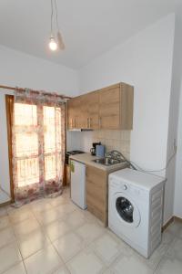 Кухня или мини-кухня в Farfalina House
