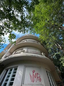 a building with the word ms written on it at River Apartment in Novi Sad
