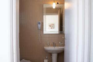 Koupelna v ubytování Giannis Rooms