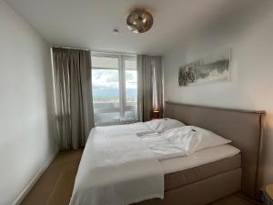 Ένα ή περισσότερα κρεβάτια σε δωμάτιο στο Apartement Förde Blick +60 φωτογραφίες
