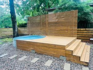 a jacuzziificialificialificialificialificialificialificialificialificialificialificial at The Hickory House with Firepit- Boat Ramp Access to Cedar Creek Lake in Tool