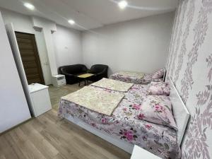 Voodi või voodid majutusasutuse Hotel Alley toas