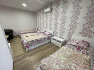 Voodi või voodid majutusasutuse Hotel Alley toas