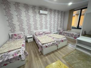 Voodi või voodid majutusasutuse Hotel Alley toas