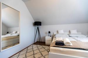 Postel nebo postele na pokoji v ubytování Park Apartman