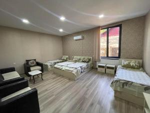 Voodi või voodid majutusasutuse Hotel Alley toas