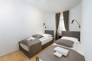 Postel nebo postele na pokoji v ubytování Rooms Luna Sol