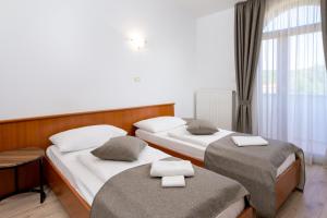 Postel nebo postele na pokoji v ubytování Rooms Luna Sol