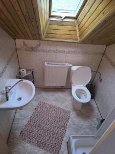 Koupelna v ubytování Apartmány Hudec