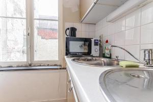 Kuchyň nebo kuchyňský kout v ubytování Spacious Shared 5BR Apt in the Heart of Gent
