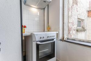 Kuchyň nebo kuchyňský kout v ubytování Spacious Shared 5BR Apt in the Heart of Gent