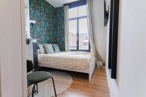 Postel nebo postele na pokoji v ubytování Spacious Shared 5BR Apt in the Heart of Gent