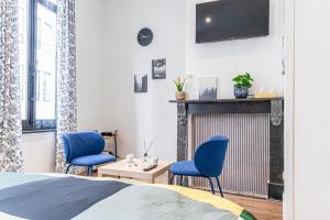 TV a/nebo společenská místnost v ubytování Spacious Shared 5BR Apt in the Heart of Gent