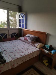 Ένα ή περισσότερα κρεβάτια σε δωμάτιο στο Marseilia Beach 1