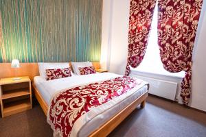 Posteľ alebo postele v izbe v ubytovaní Hotel Mezní Louka
