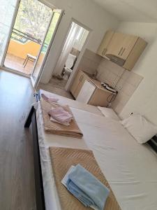 Kuchyň nebo kuchyňský kout v ubytování Apartments Ana + 28 fotografií