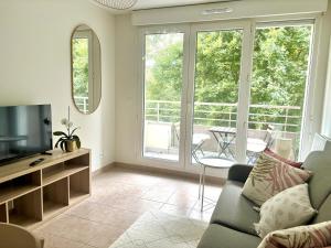 Et tv og/eller underholdning på Parisian escape near Disney - Liz Appart