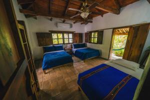 Postel nebo postele na pokoji v ubytování Hotel Hacienda San Lucas + 37 fotografií