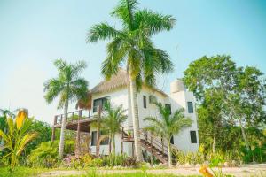 Zahrada ubytování Royal Palm Bacalar Cabañas & Lagoon Club