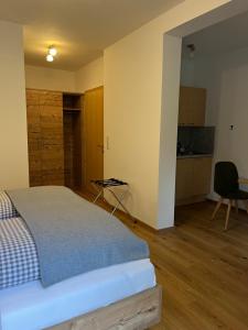 Voodi või voodid majutusasutuse Sagebruenndle Appartements toas