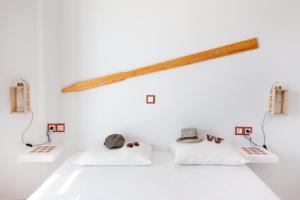 Posteľ alebo postele v izbe v ubytovaní Ailouros summer hotel