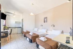 Postel nebo postele na pokoji v ubytování Saint Peter Bay Aparthotel + 25 fotografií