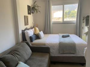Postel nebo postele na pokoji v ubytování Laguna Hostel