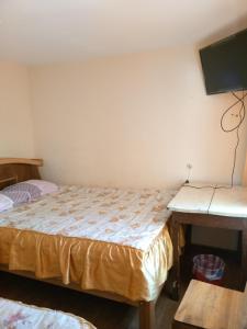 Una cama o camas en una habitación de Conquistador