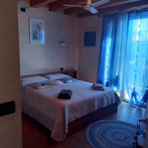 Postel nebo postele na pokoji v ubytování B&B Palmagrill