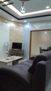 Μια τηλεόραση ή/και κέντρο ψυχαγωγίας στο Appartement meublé