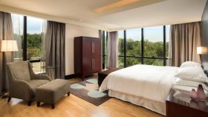 Postel nebo postele na pokoji v ubytování Mak Albania Hotel