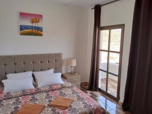 Postel nebo postele na pokoji v ubytování Petra Planet